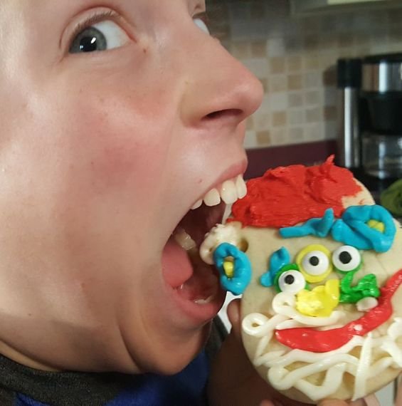 boy eating christmas cookie